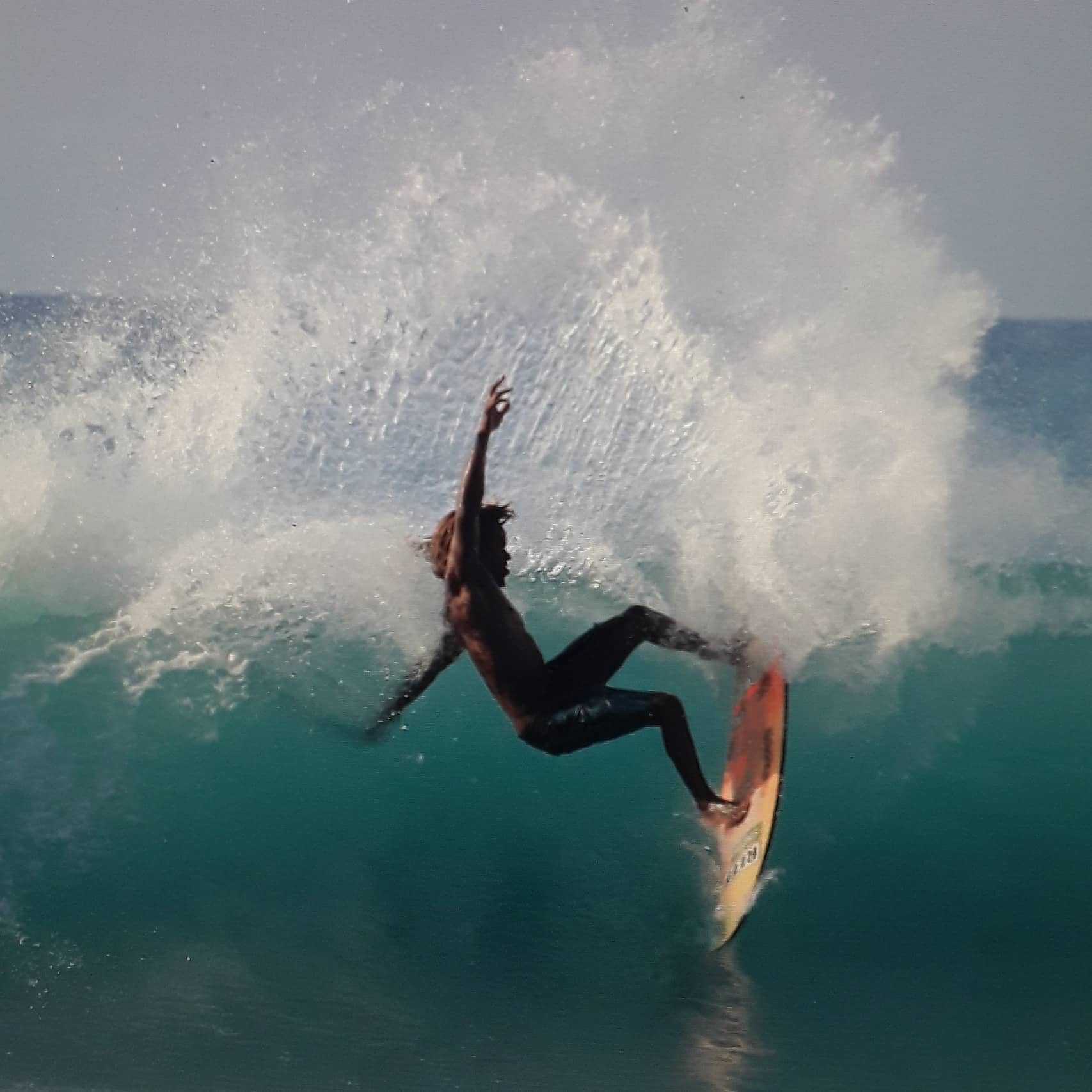 Surfing in Jamaica - Image by Billy Mistic Wilmot 